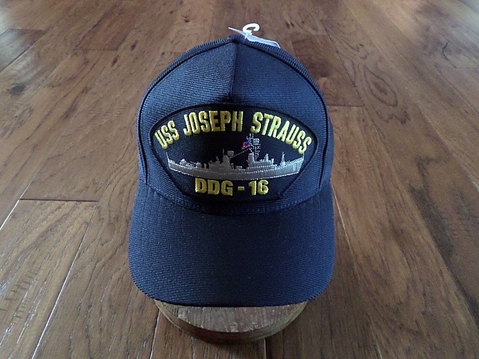 thumbnail interactive-video image 1 of USS Benjamin Stoddert DDG-22 Navy Ship Hat – Official U.S. Military Ball Cap, Dark Navy Blue, Adjustable Snapback, Classic Green Undervisor 1 of 5