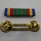 NAVY UNIT COMMENDATION RIBBON WITH BRASS RIBBON HOLDER US MILITARY