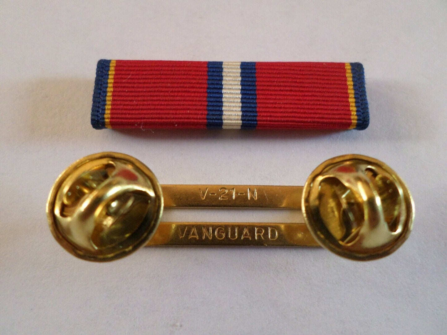 COAST GUARD RESERVE GOOD CONDUCT RIBBON WITH BRASS RIBBON HOLDER VETERAN