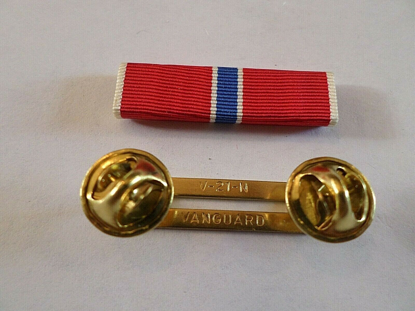 BRONZE STAR RIBBON WITH BRASS RIBBON HOLDER U.S MILITARY VETERAN