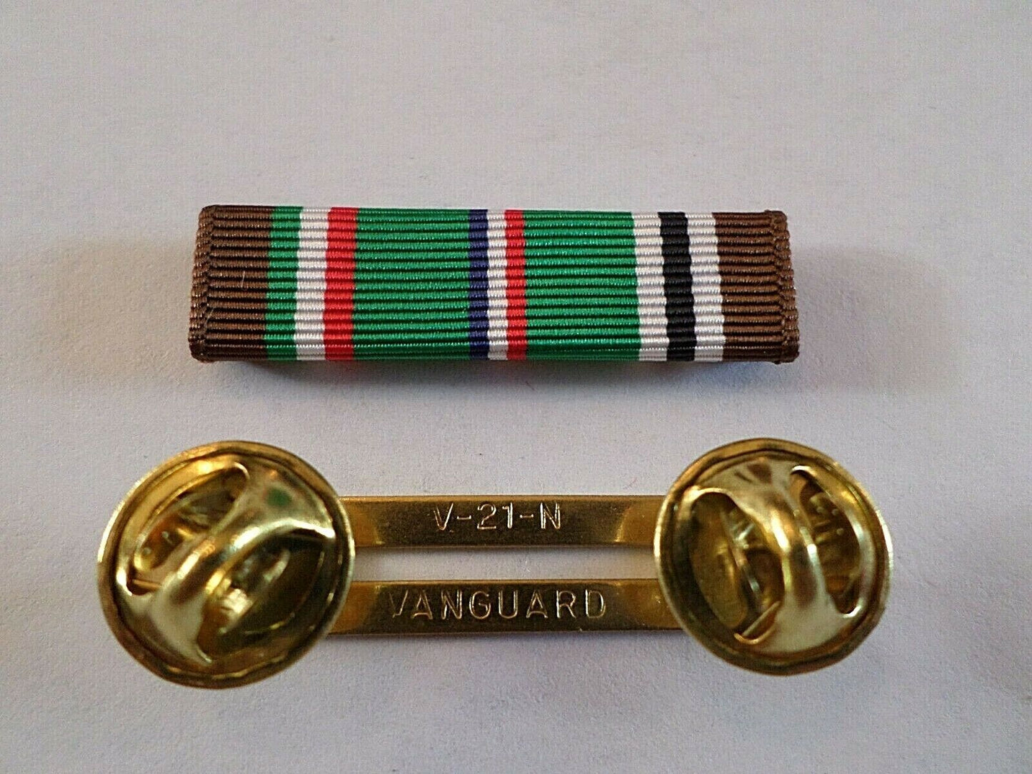 EUROPEAN AFRICAN MIDDLE EASTERN CAMPAIGN RIBBON WITH BRASS RIBBON HOLDER