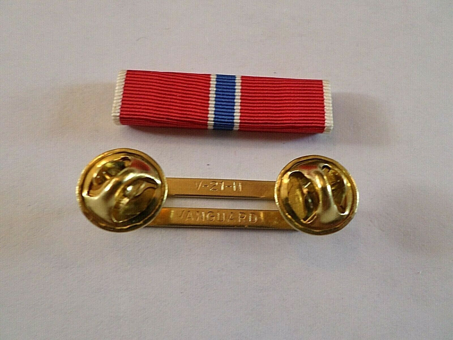 BRONZE STAR RIBBON WITH BRASS RIBBON HOLDER U.S MILITARY VETERAN