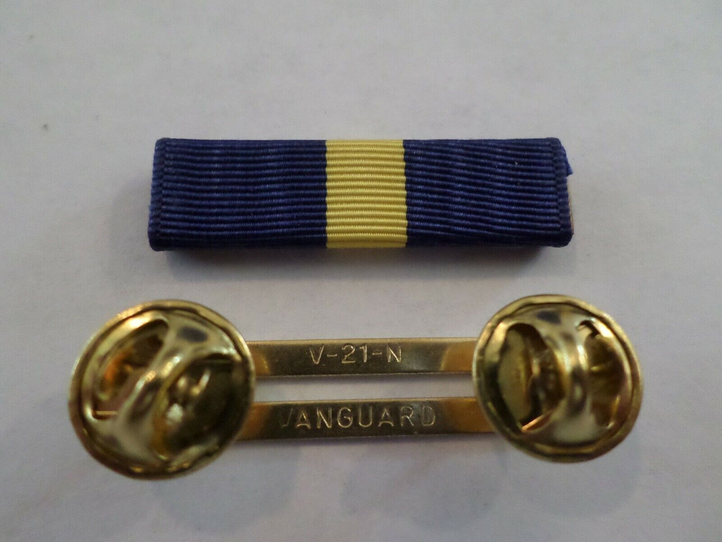 NAVY DISTINGUISHED SERVICE RIBBON WITH BRASS RIBBON HOLDER US MILITARY