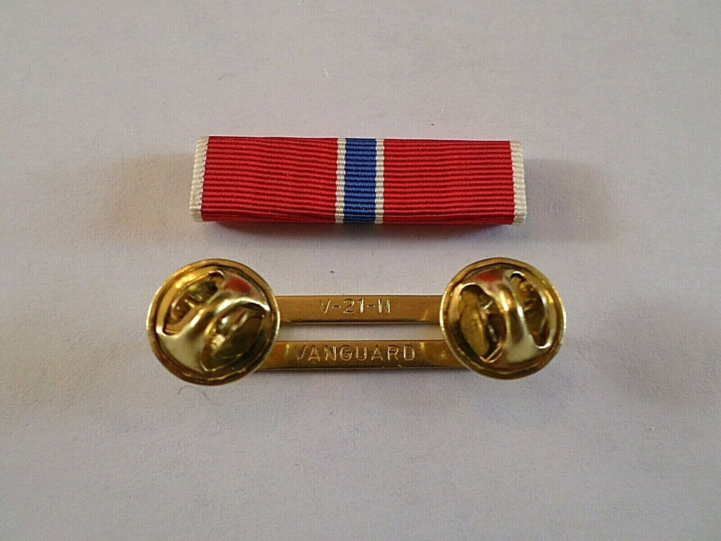 BRONZE STAR RIBBON WITH BRASS RIBBON HOLDER U.S MILITARY VETERAN